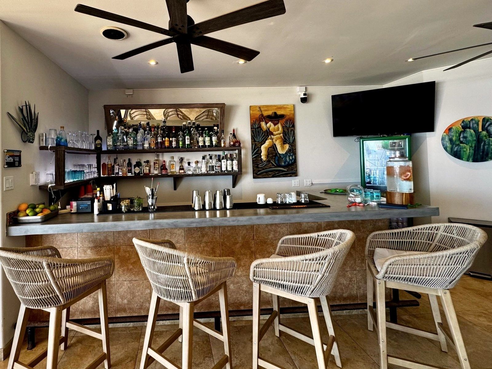 The polished bar counter at The Sunset Restaurant & Bar